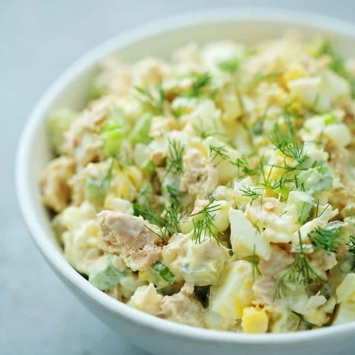 white bowl filled with tuna egg salad
