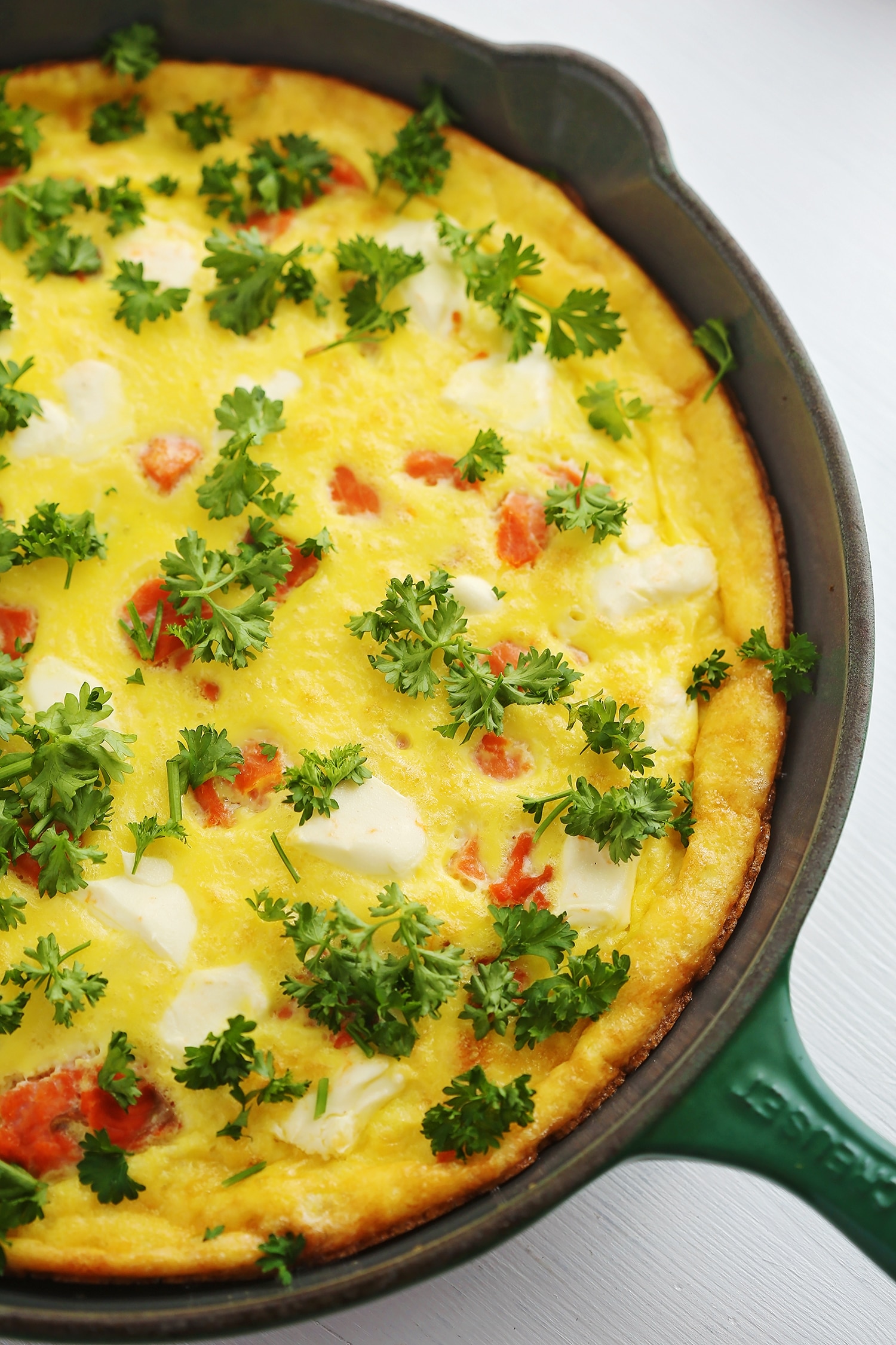 Salmon Frittata with Cream Cheese in a cast iron pan