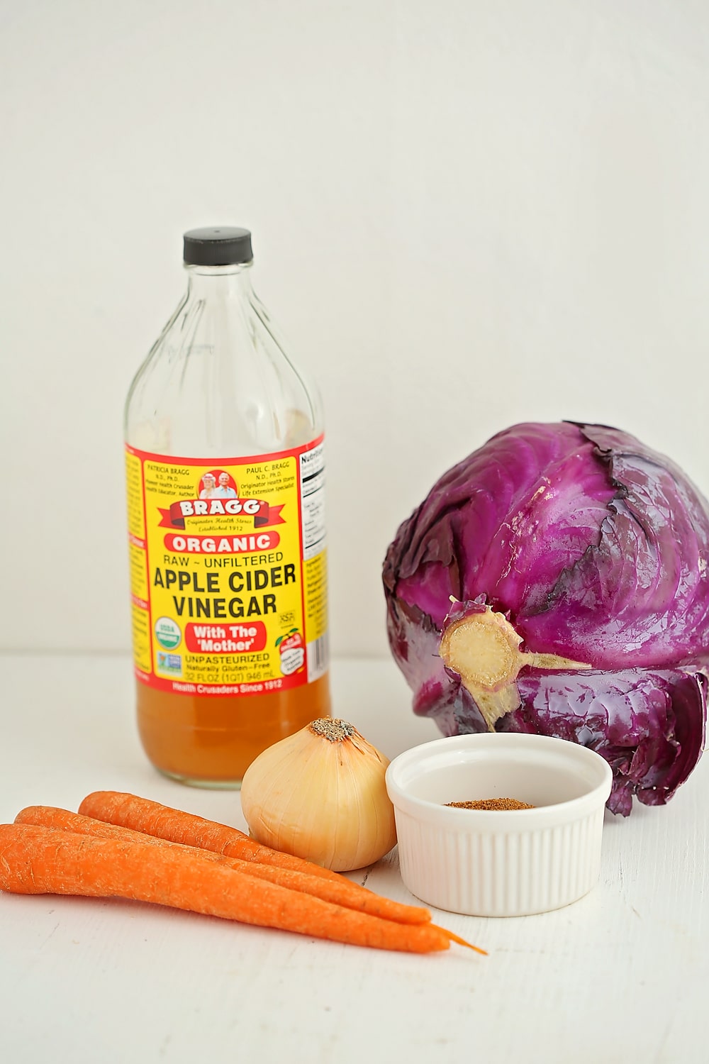 ingredients to make quick pickled cabbage with carrots slaw