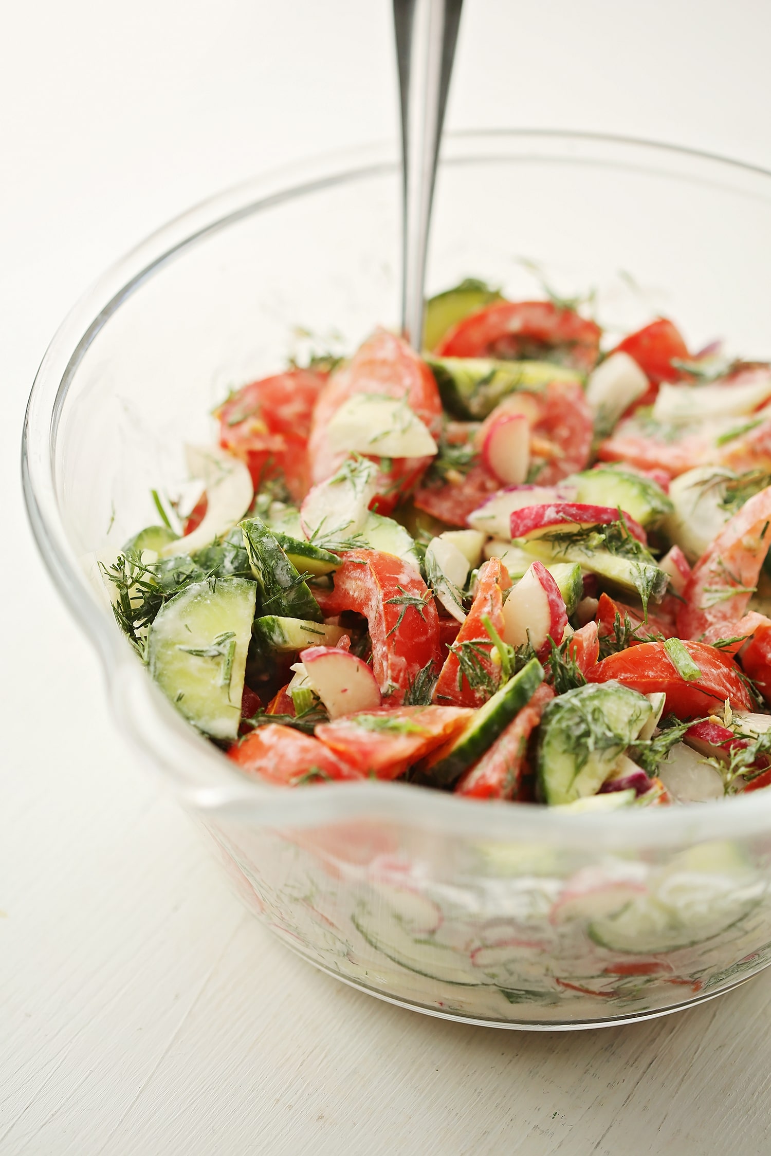 glass mixing bowl with salad with vegatables