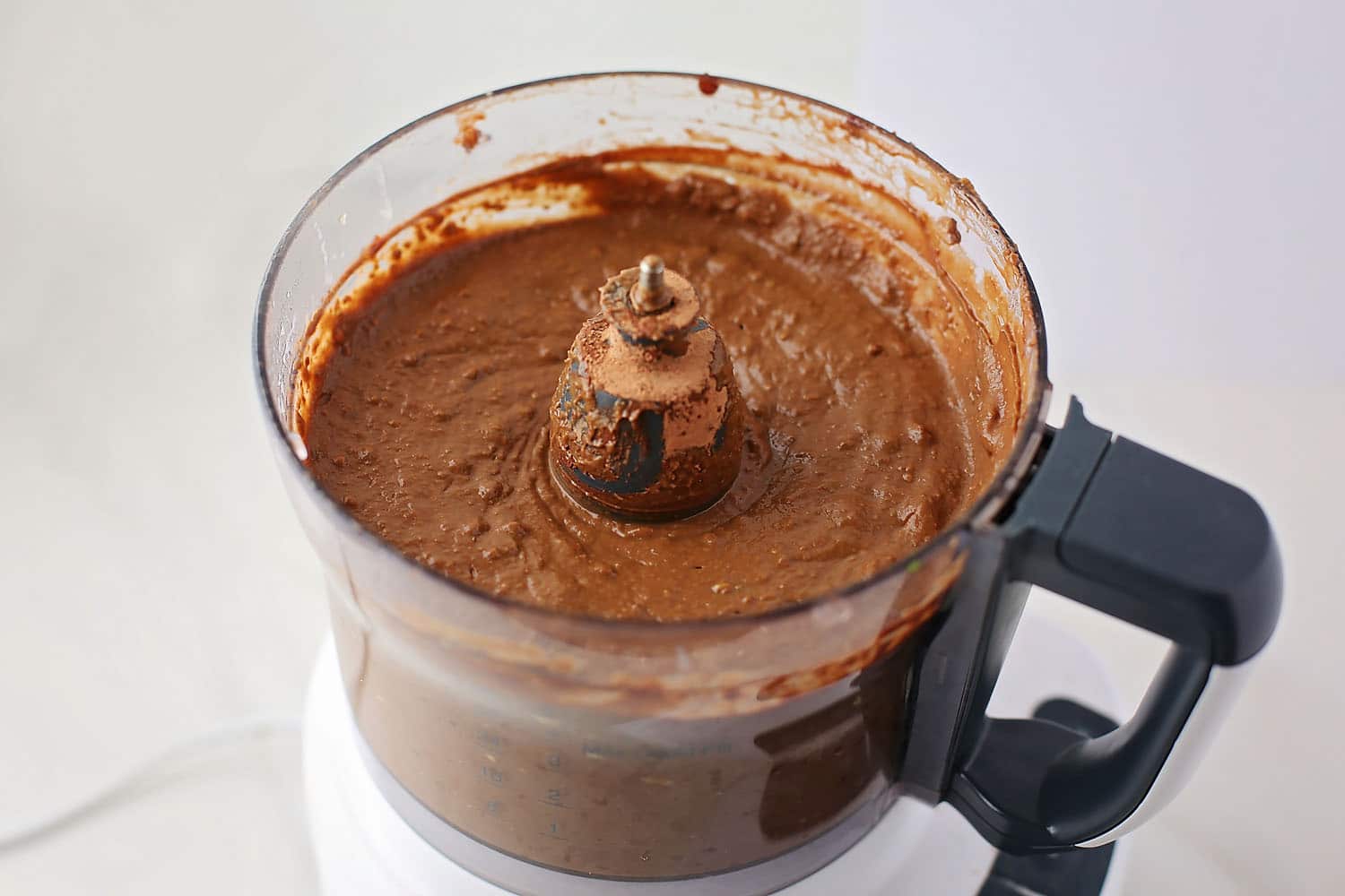 food processor with chocolate mixture for mousse with avocado
