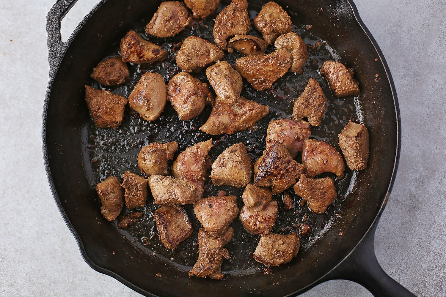 fried beef liver in the skillet