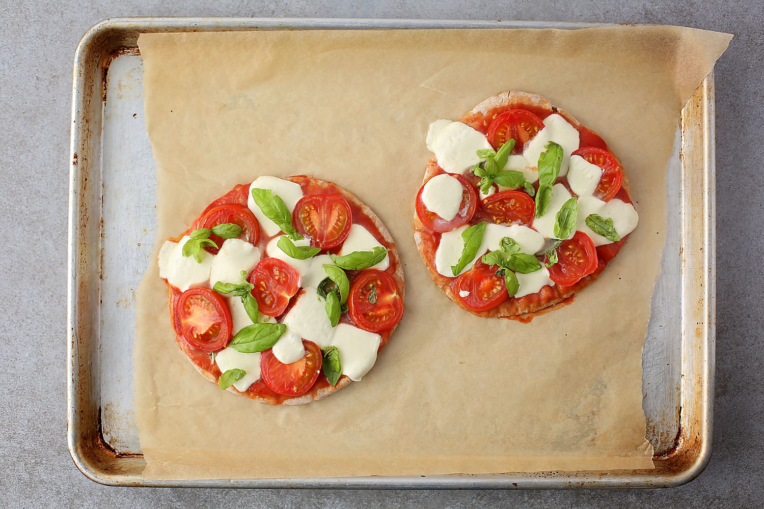 freshly baked Pita Pizza (10-minute pizza) on a baking sheet
