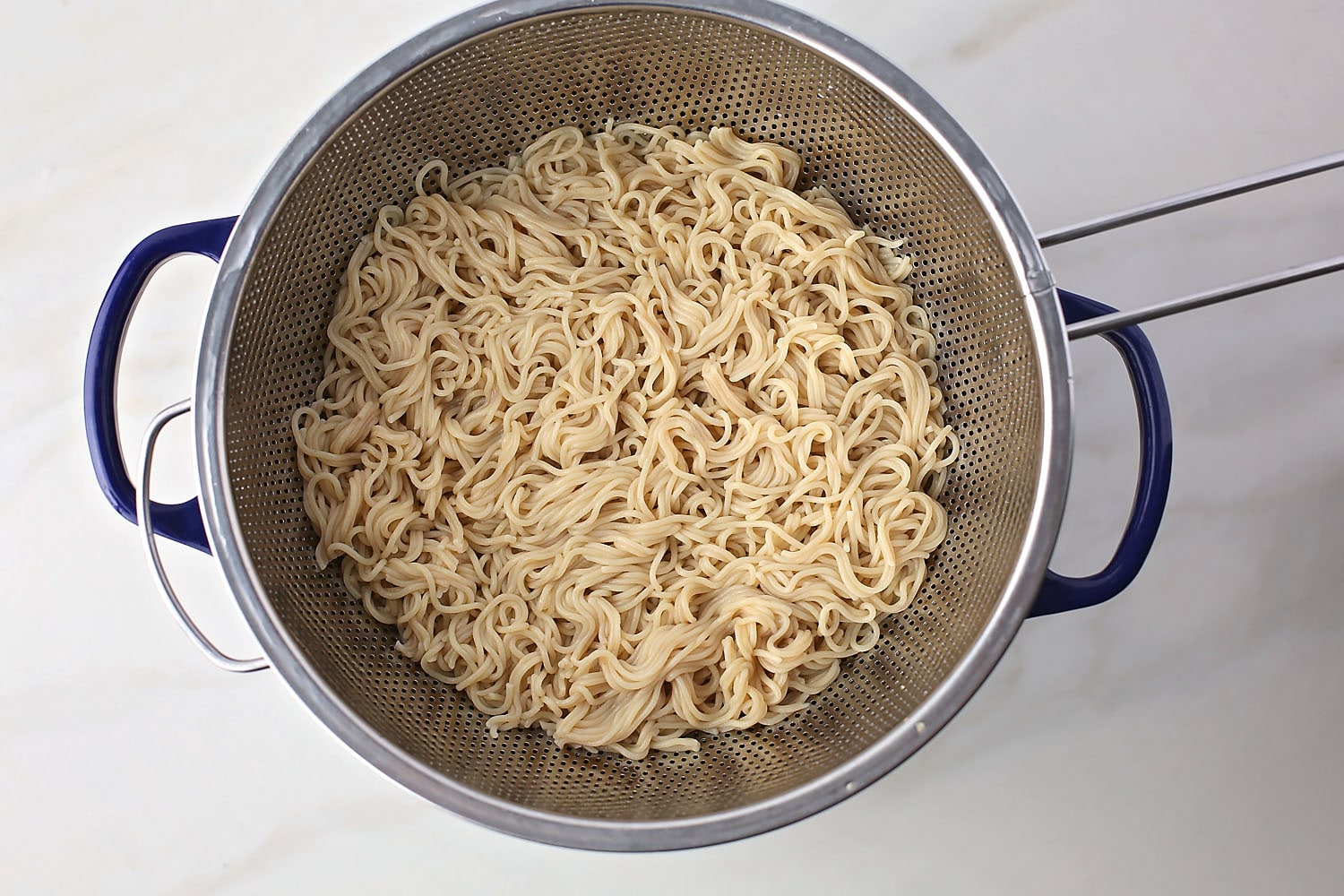 freshly cooked noodles in the pan