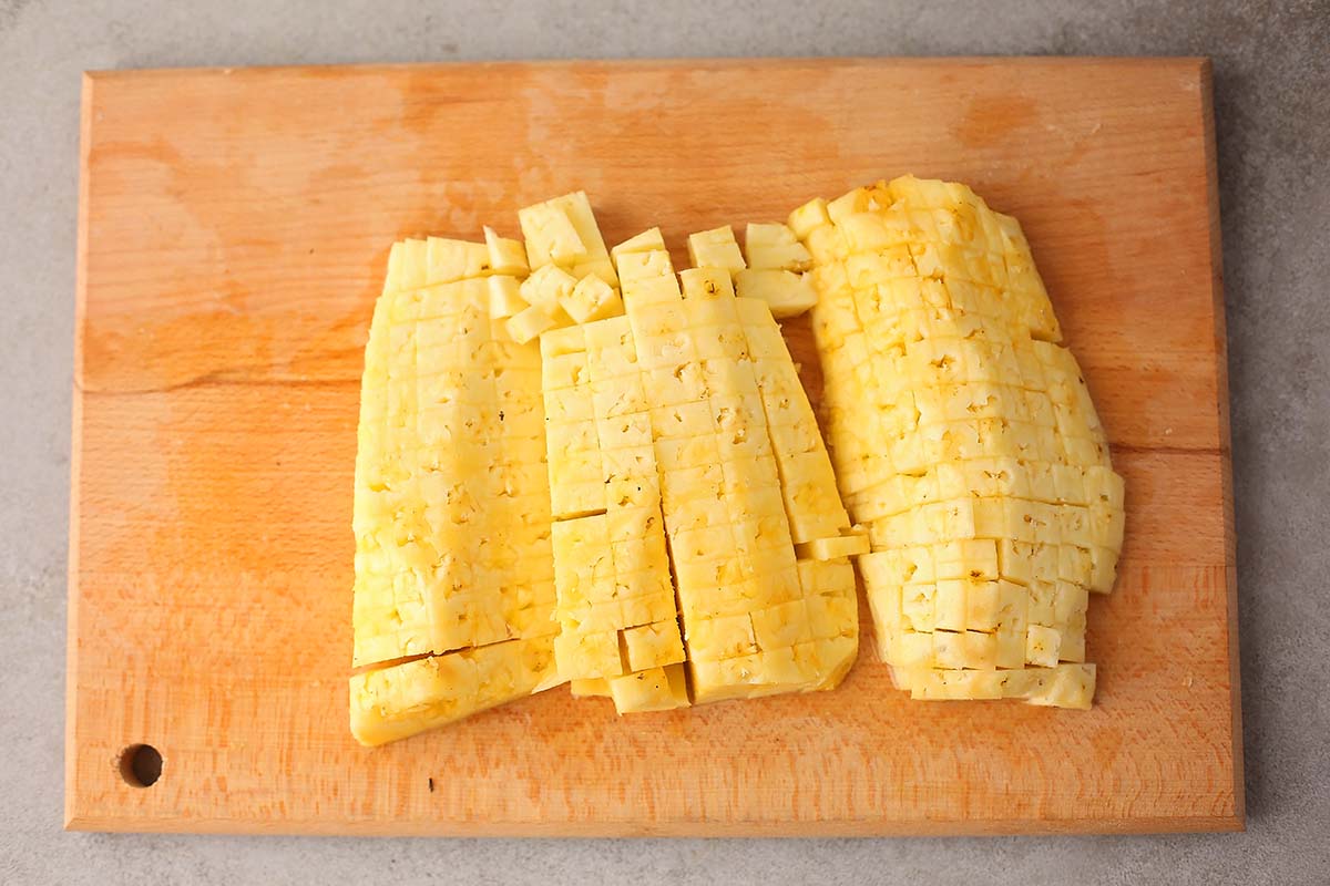 sliced pineapple on the cutting board