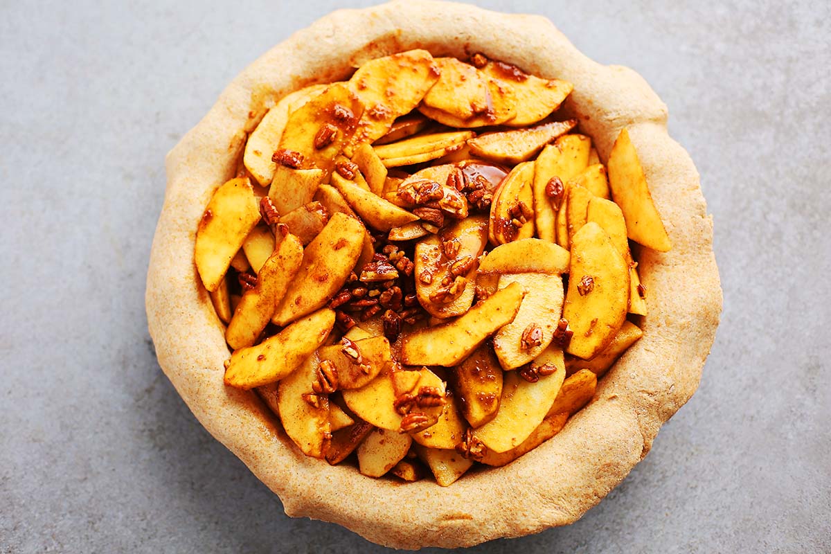 apple pie dish with pie pastry and apple pie filling