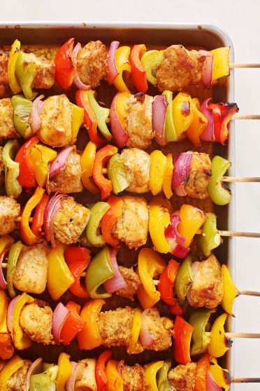 wooden skewers with chicken and bell peppers