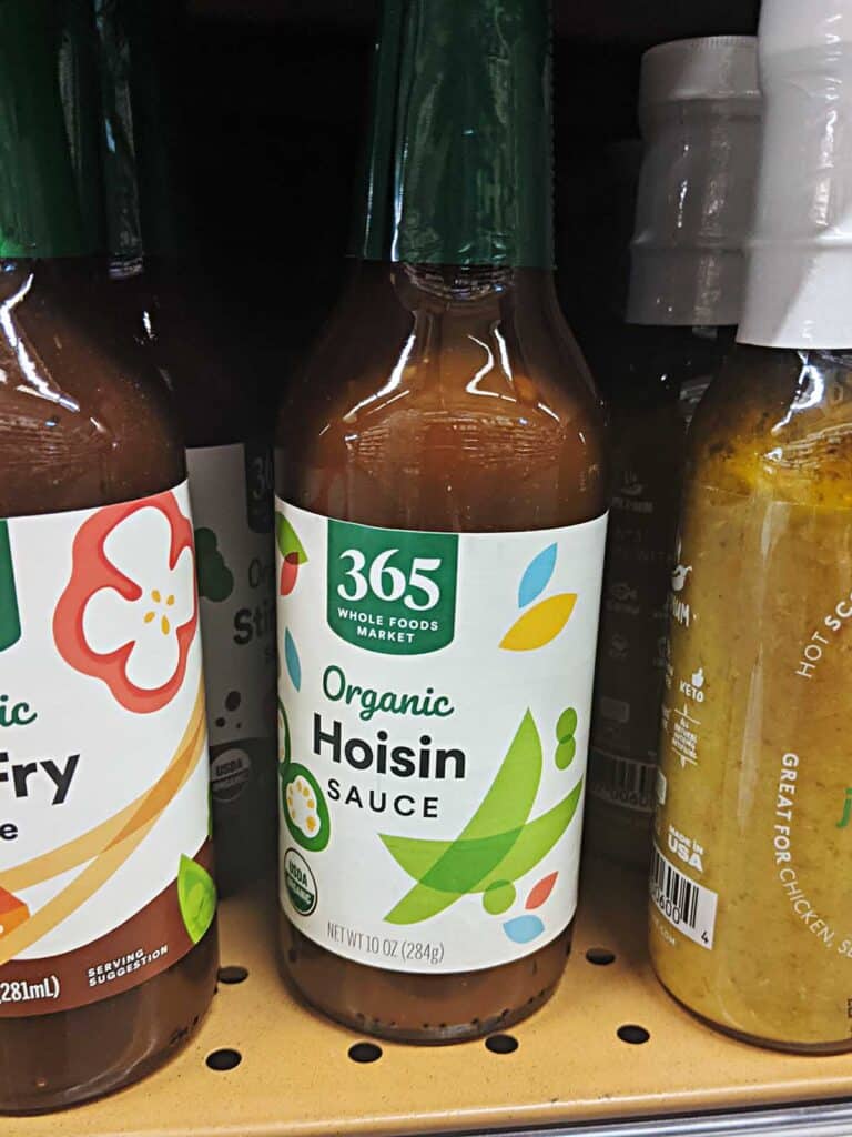 Bottle of hoisin sauce on the shelf at the store. 