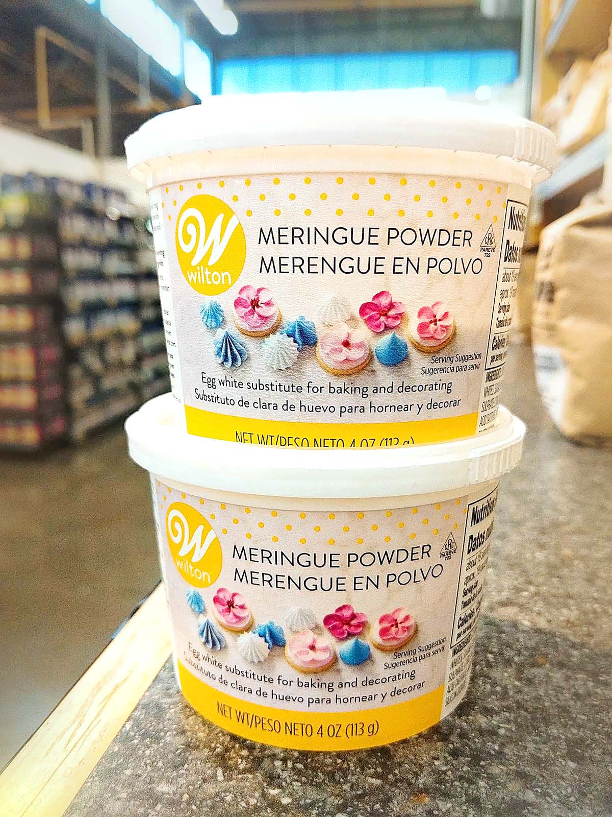 two cans of Wilton brand meringue powder