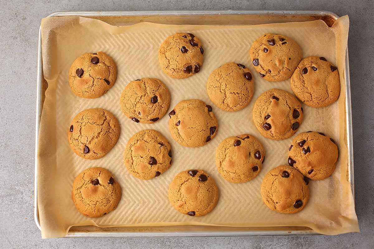 baking pan with freshly baked cookies with chocolate chips