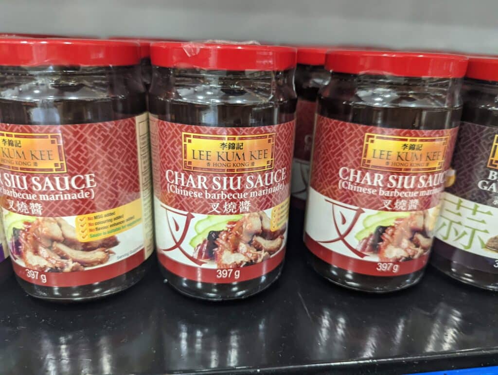 Jar with char siu sauce on the shelf at the store. 