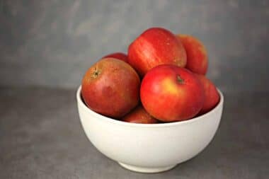 bowl filled with red apples