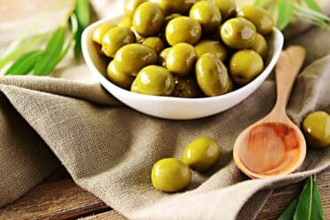 bowl filled with green olives.