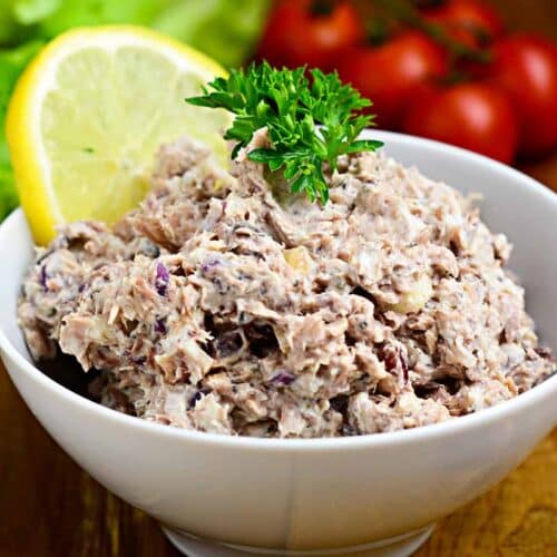 White bowl filled with tuna salad.