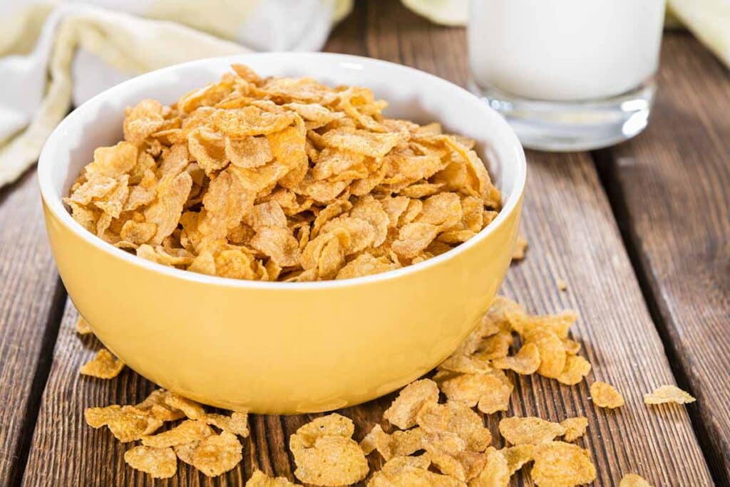 Bowl filled with cornflakes. 