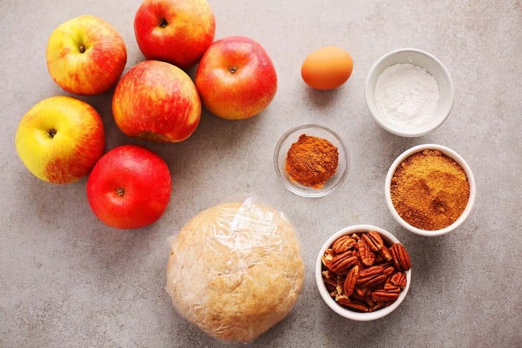 Ingredients to make apple pie including apple pie spice. 