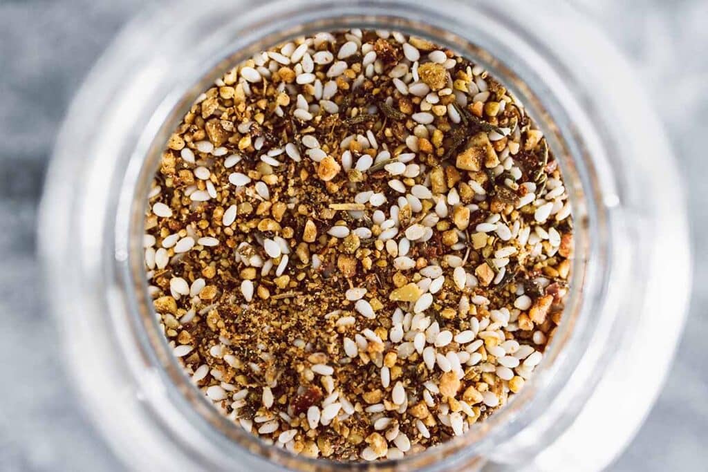 Close up shot of homemade Zaatar spice inside the jar. 