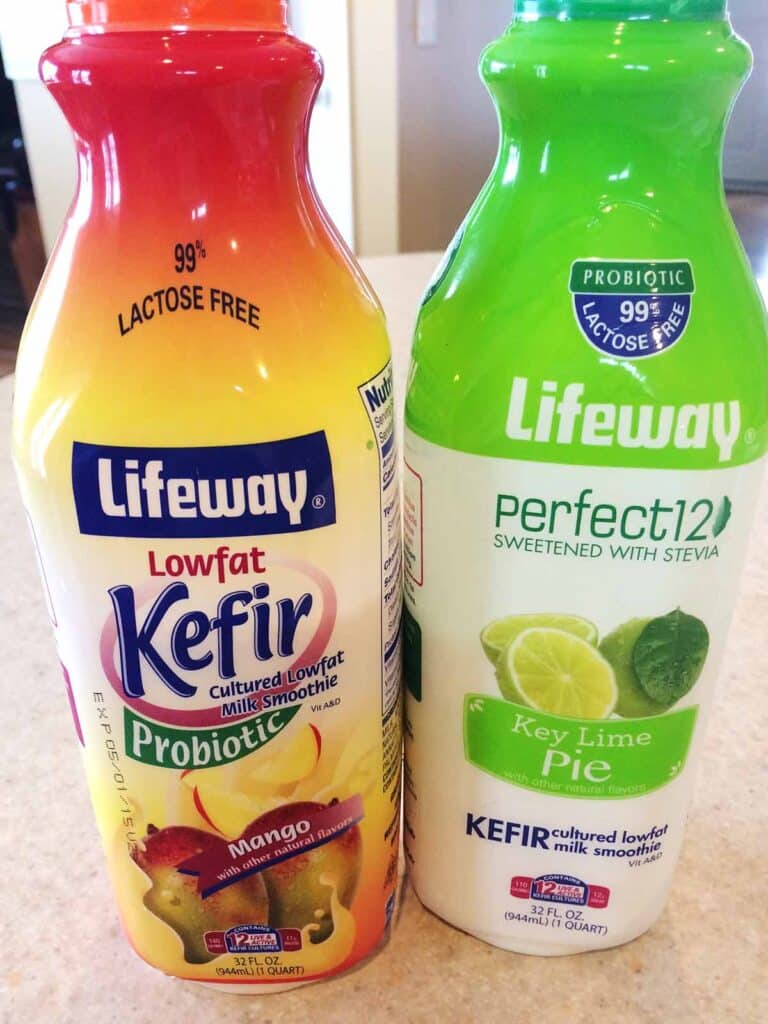 Two bottles with flavored kefir, close up shot. 
