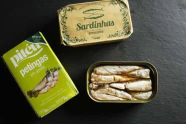 Open can of sardines, above image.