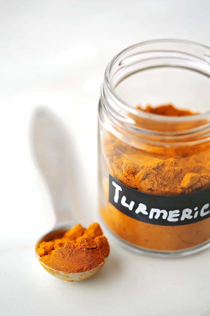 Spice jar with label turmeric. 